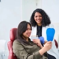 Dr. Praveena Amruthakavi - Specialist Prosthodontist & Cosmetic Dentist